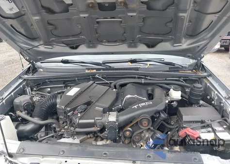 2014 Toyota Tacoma Base V6 z USA, uszkodzony, nr VIN 3TMMU4FN9EM064381